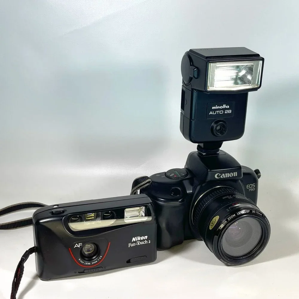 Canon E05 750 35mm camera and Nikon Fun touch 2 35mm camera